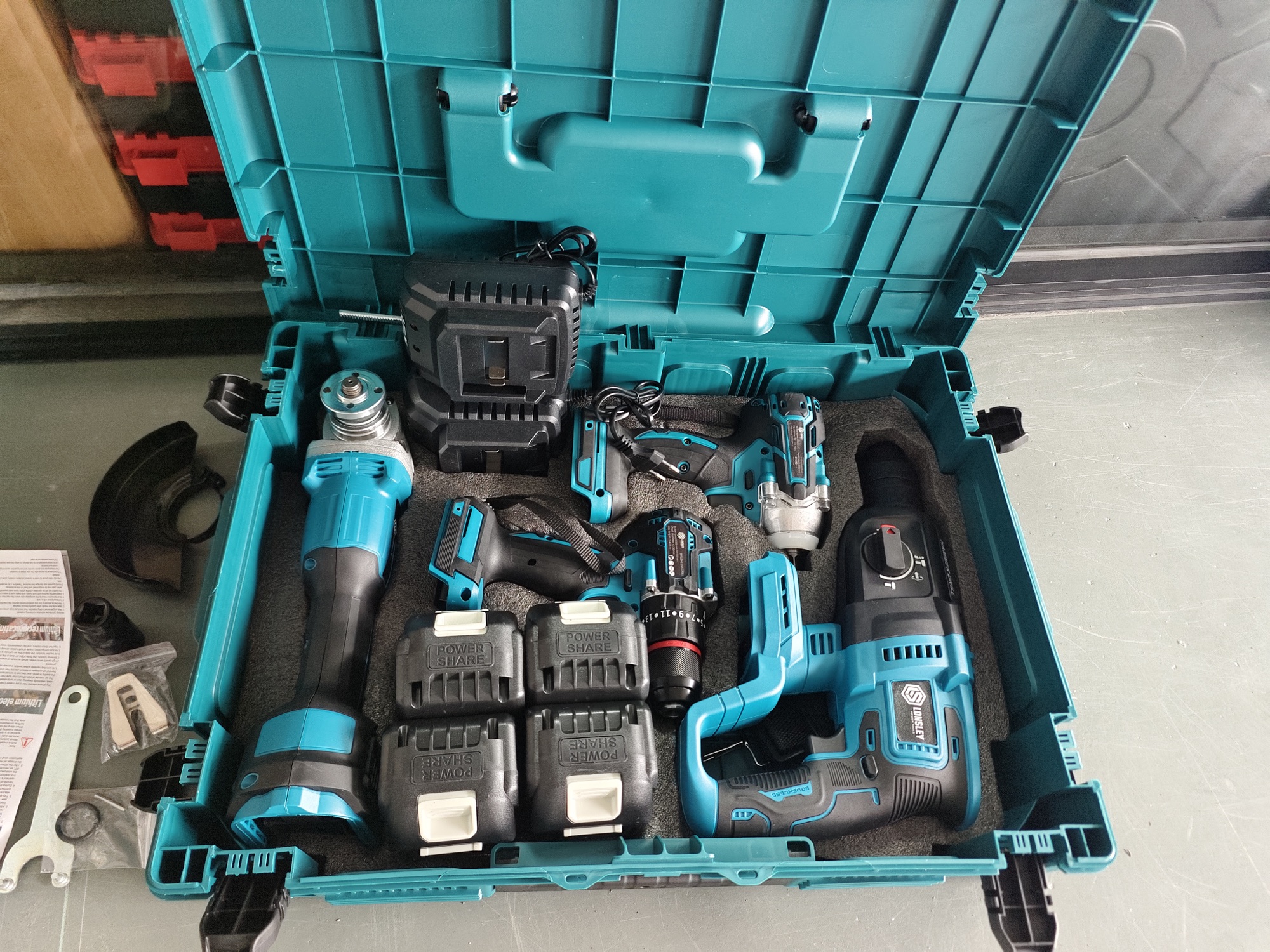 Open LONSLEY tool case showing four brushless tools, four batteries and two chargers